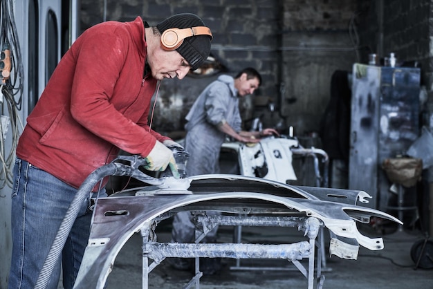 car service worker repairs restores car 154092 12789